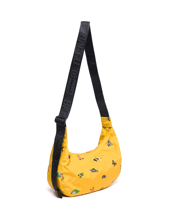 Shop Naturalist Club BAGGU Medium Nylon Crescent Bag Inspired by National Parks | mustard